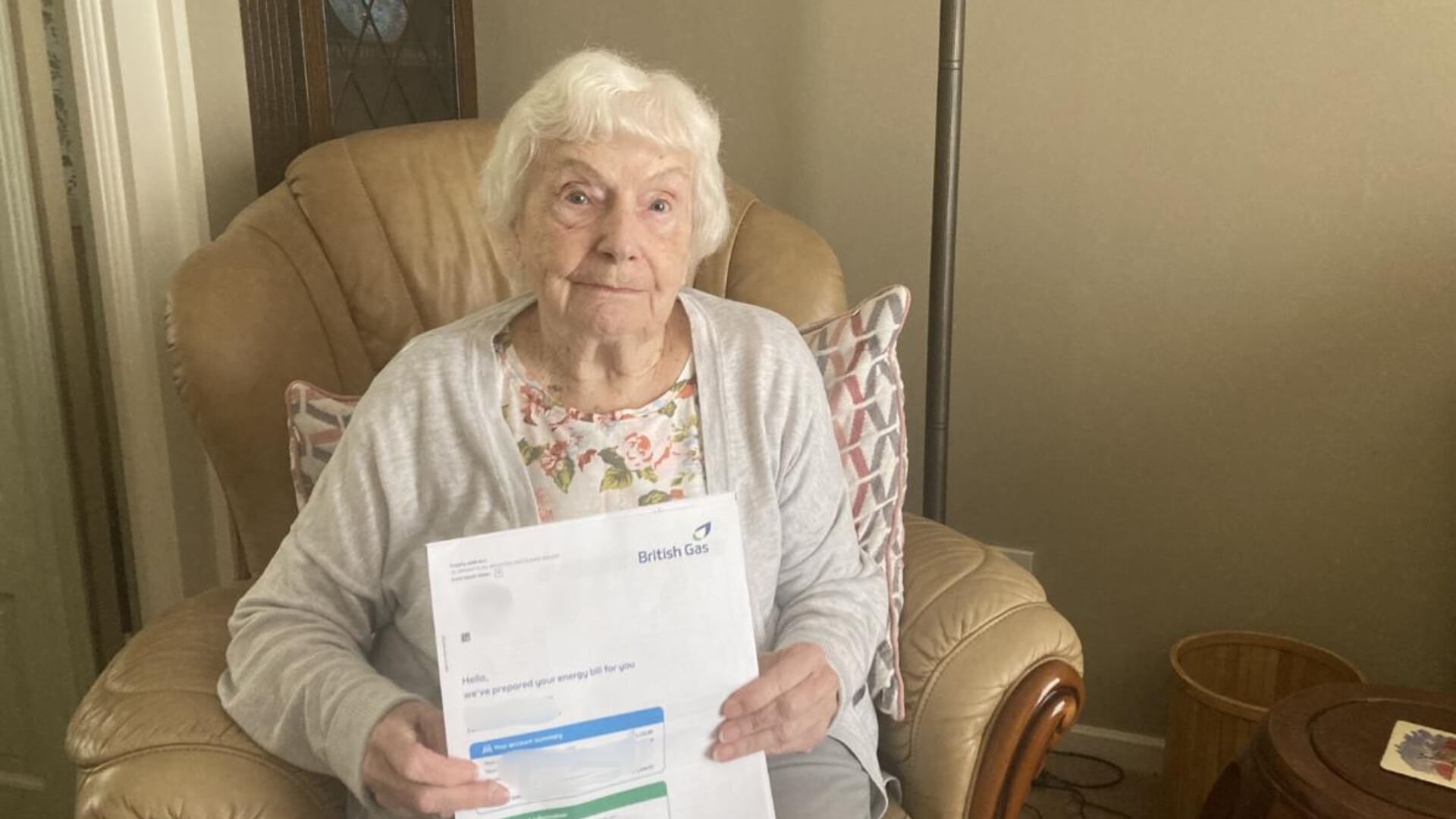 Grandmother showing energy bills
